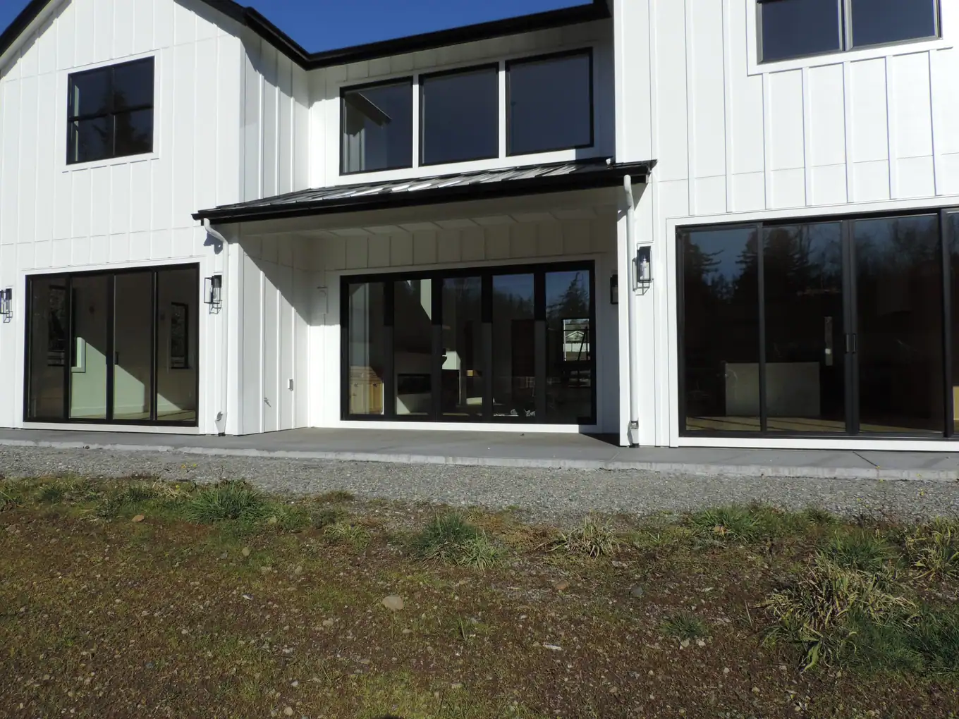 Rear elevation with gables and large sliding doors
