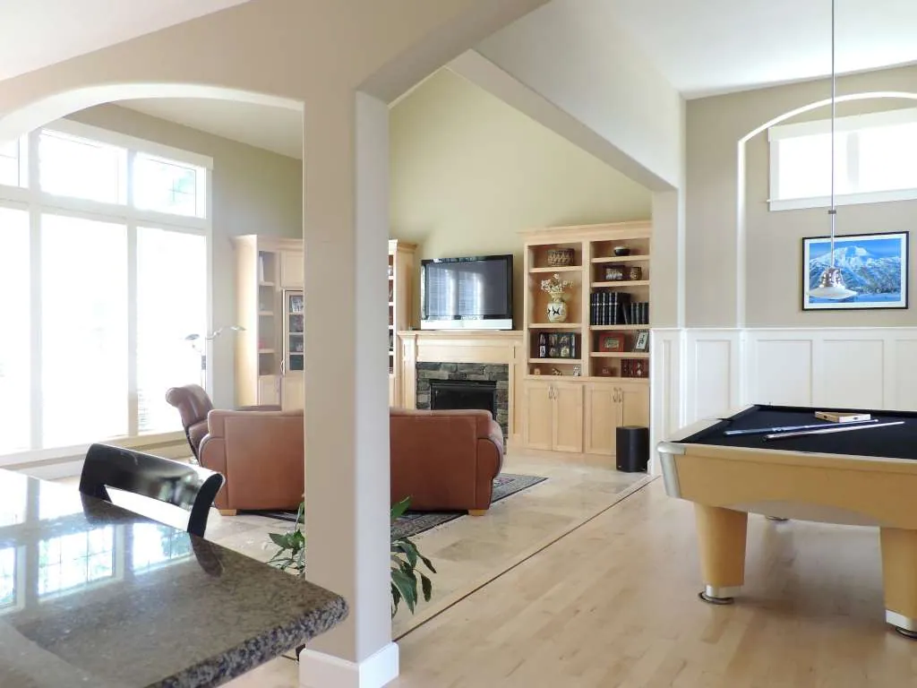 Great room with maple built-ins around a fireplace